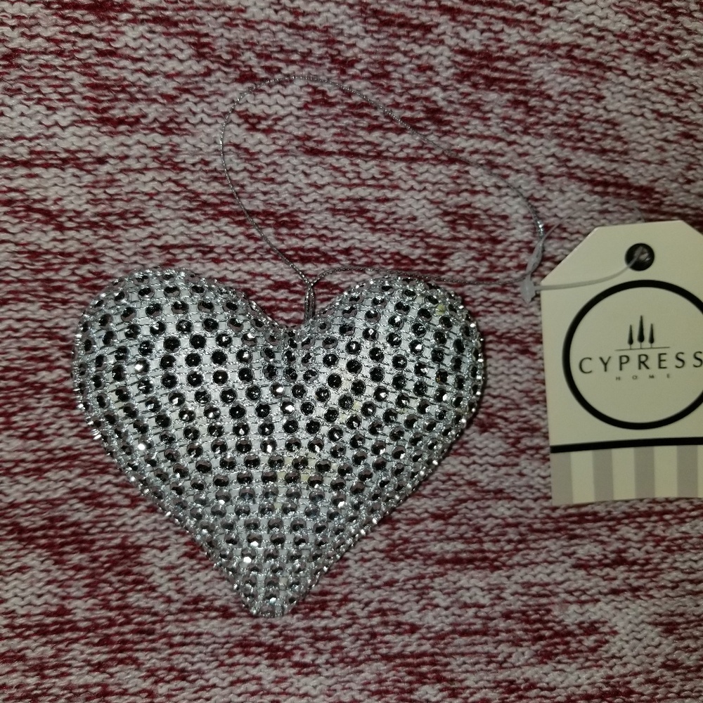 Silver sequins heart ornament. You can hang it anO